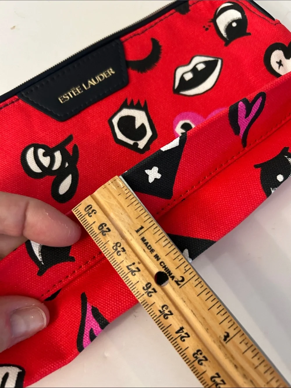 Estée Lauder Red Cosmetic Pouch with beasts, Mickey heads and cute graphics